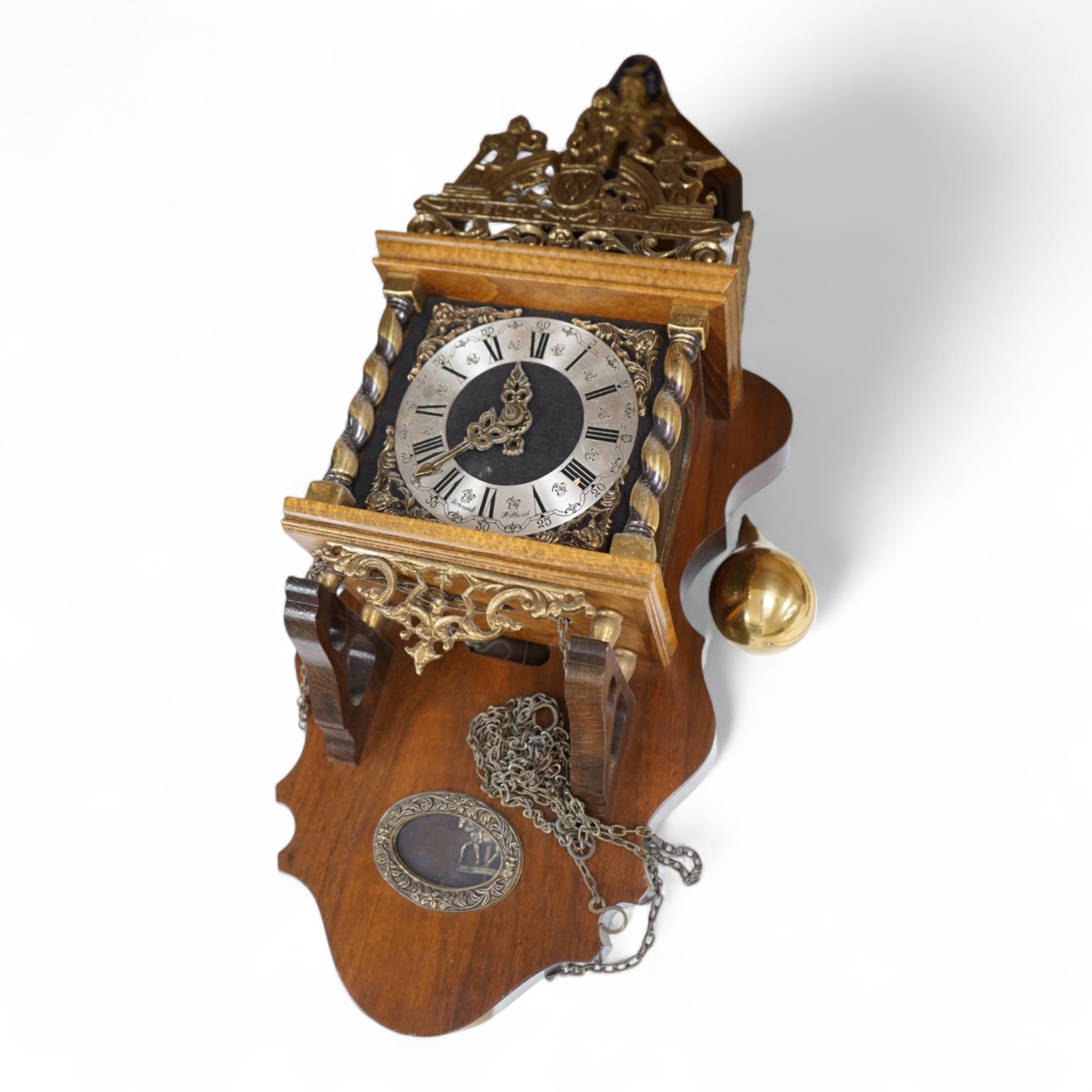A reproduction Dutch style wall clock, 62cm